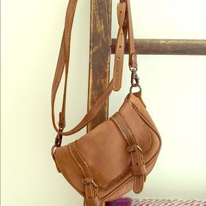 Roots crossbody small saddle bag in tan